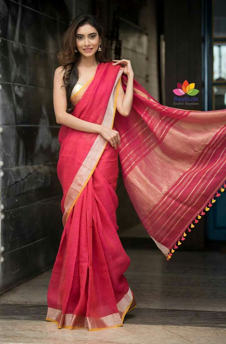 Young Woman in an Elegant Red Saree Dress Posing Outdoors · Free Stock Photo-sonthuy.vn