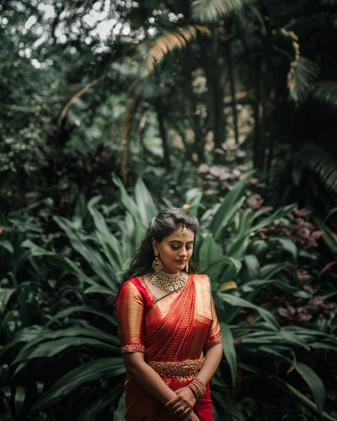 Beautiful Indian young girl in Traditional Saree posing outdoors 4982536  Stock Photo at Vecteezy